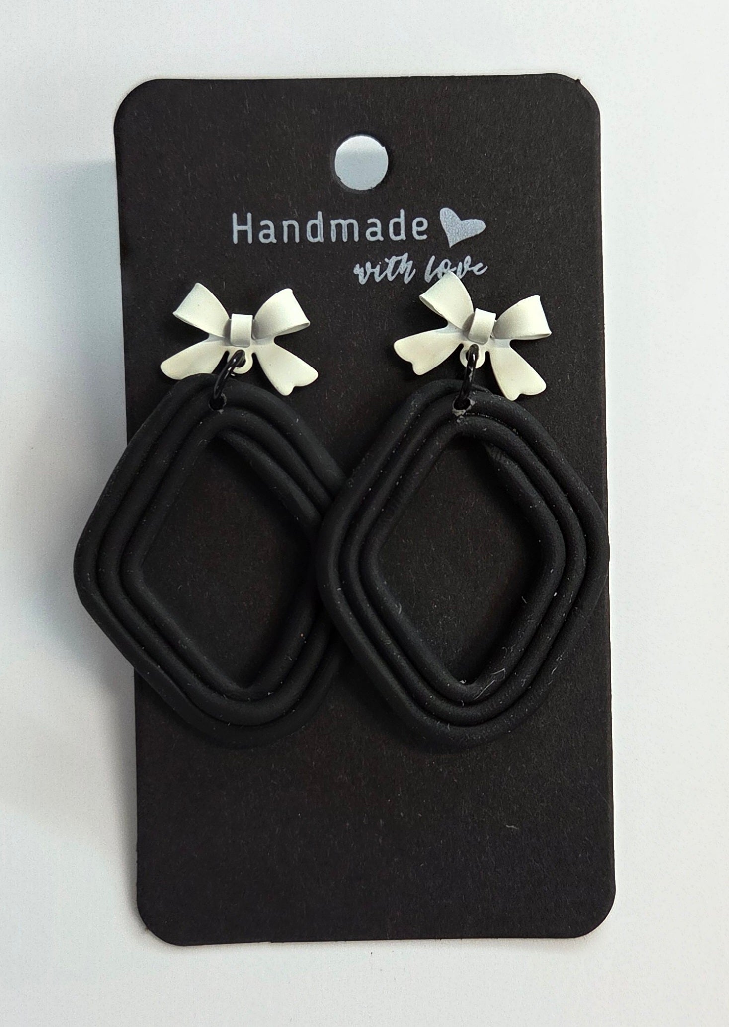 White Bow Black Dimond Shape Stud Dangle!