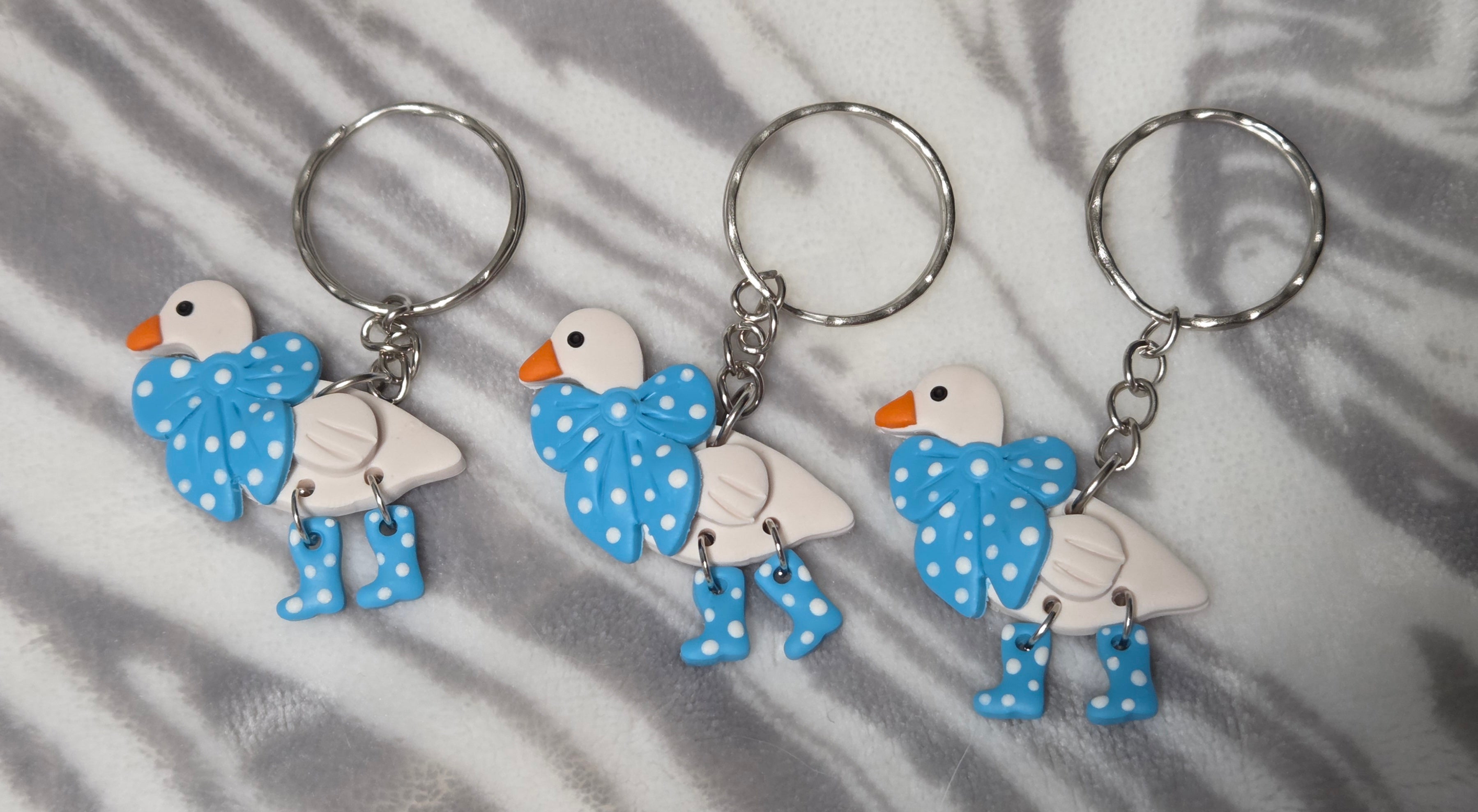 DUCK IN BLUE BOOTS WITH BLUE BOW KEYCHAIN!