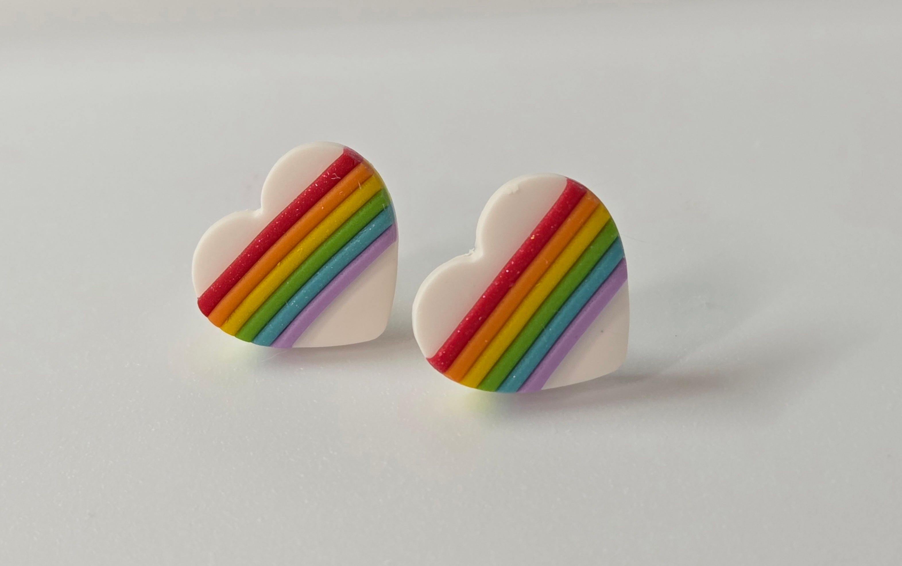 WHITE OR BLACK RAINBOW HEART STUD EARRINGS!