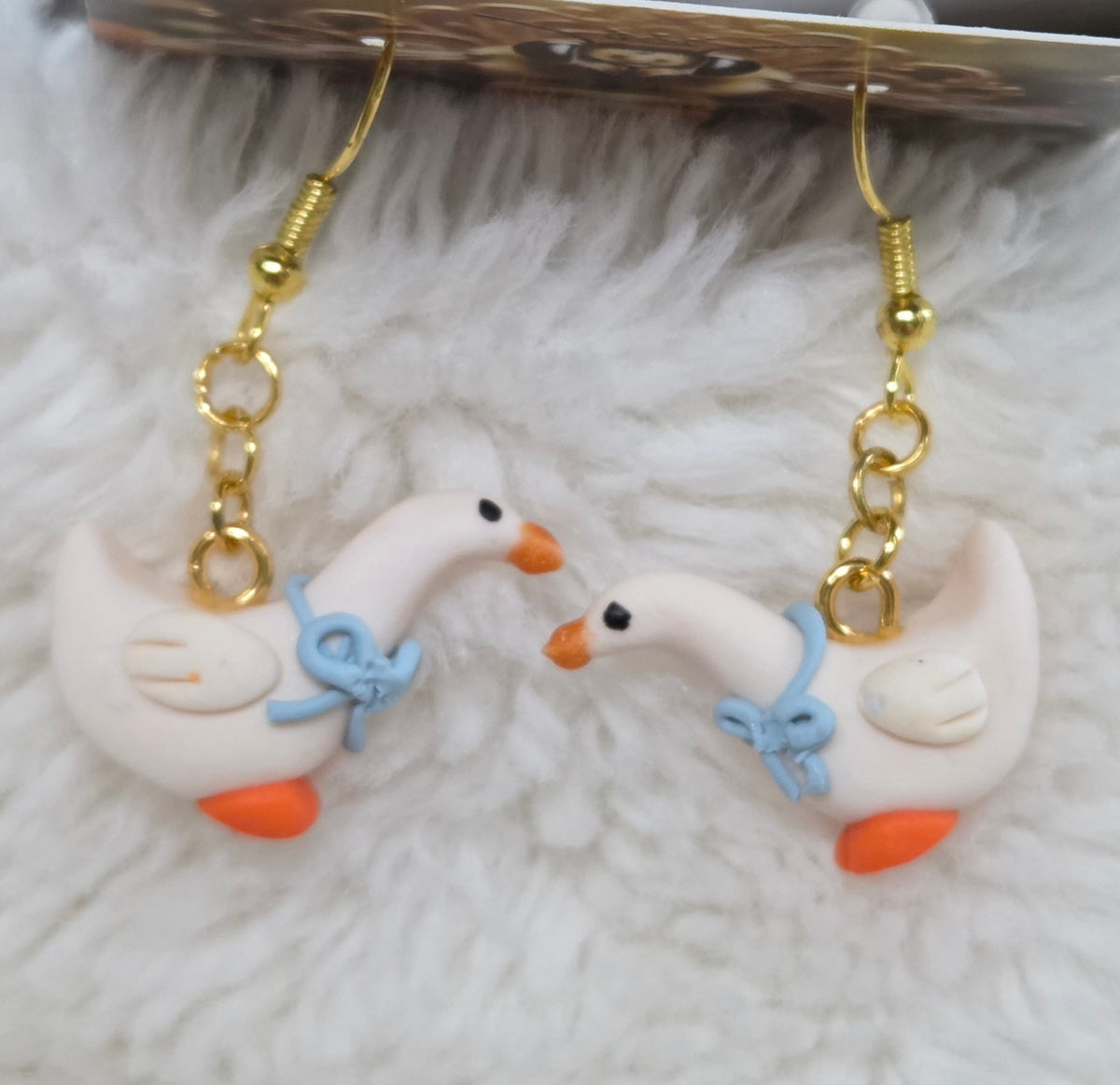GOOSE WITH BLUE BOWS DANGLE EARRINGS!